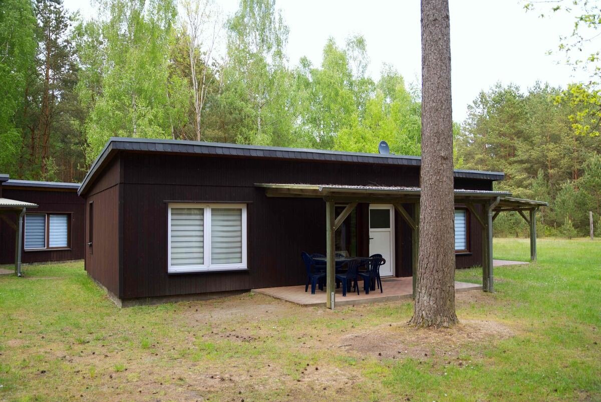 Bungalow mit Terrasse und Sitzbereich